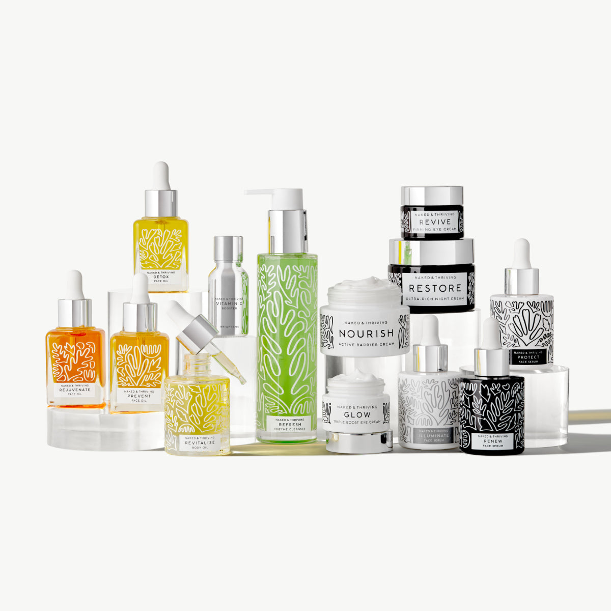 Naked & Thriving The Everything Collection, complete collection of serum, face oil, and cream bottles and jars