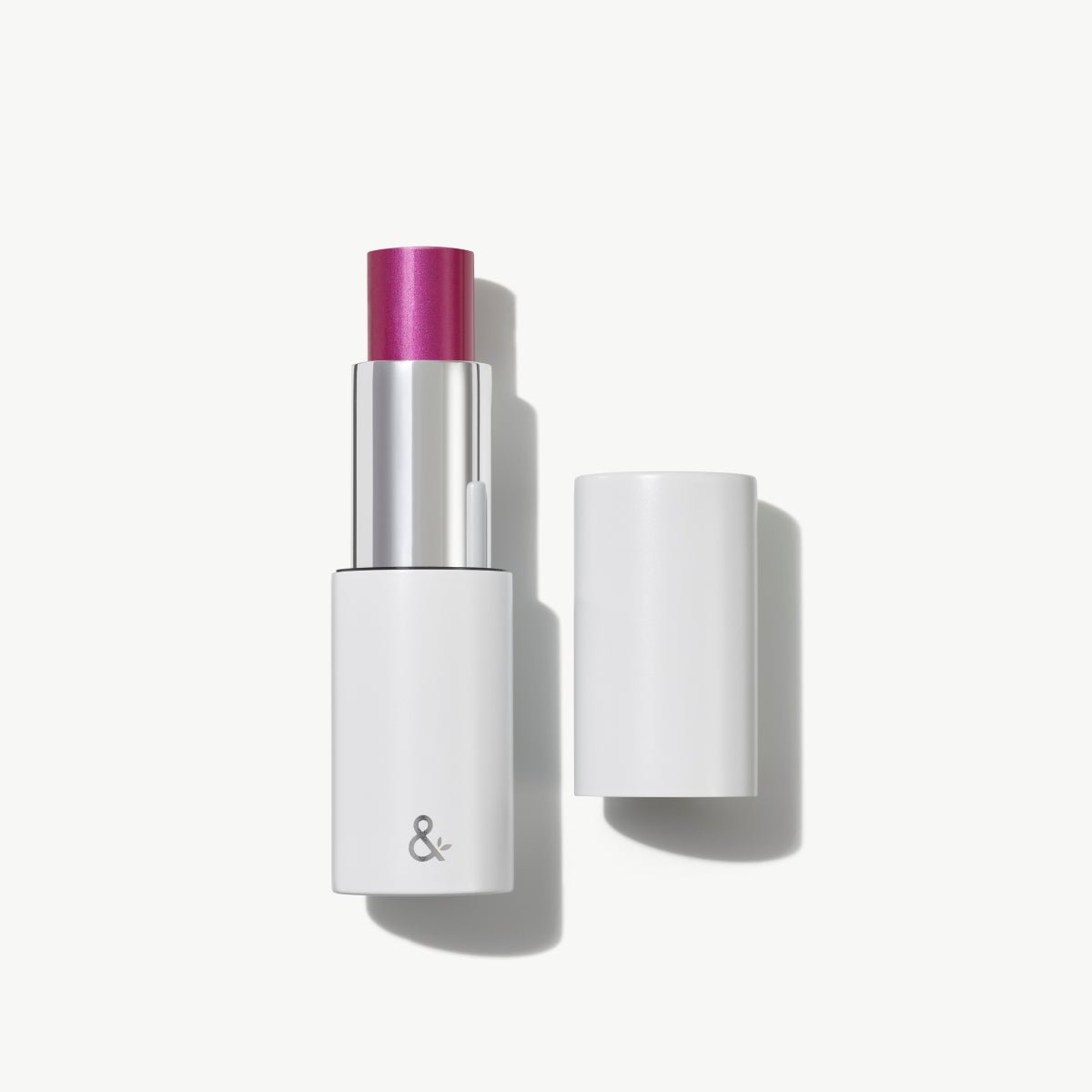 
                
                  HydraTint multi-stick (Wild tint) with cap removed showing plum-colored balm
                
              