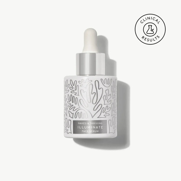 Naked & Thriving Illuminate BC+ Brightening Serum in white glass dropper bottle with light botanical pattern