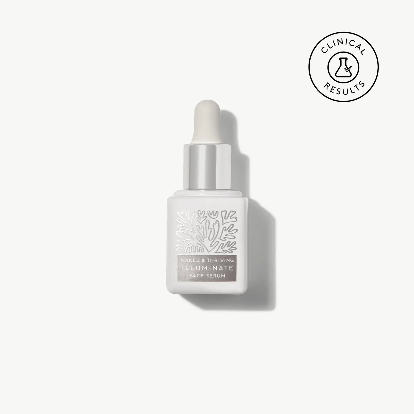 
                
                  Naked & Thriving travel-size Illuminate BC+ Brightening Serum in white glass dropper bottle with botanical pattern
                
              