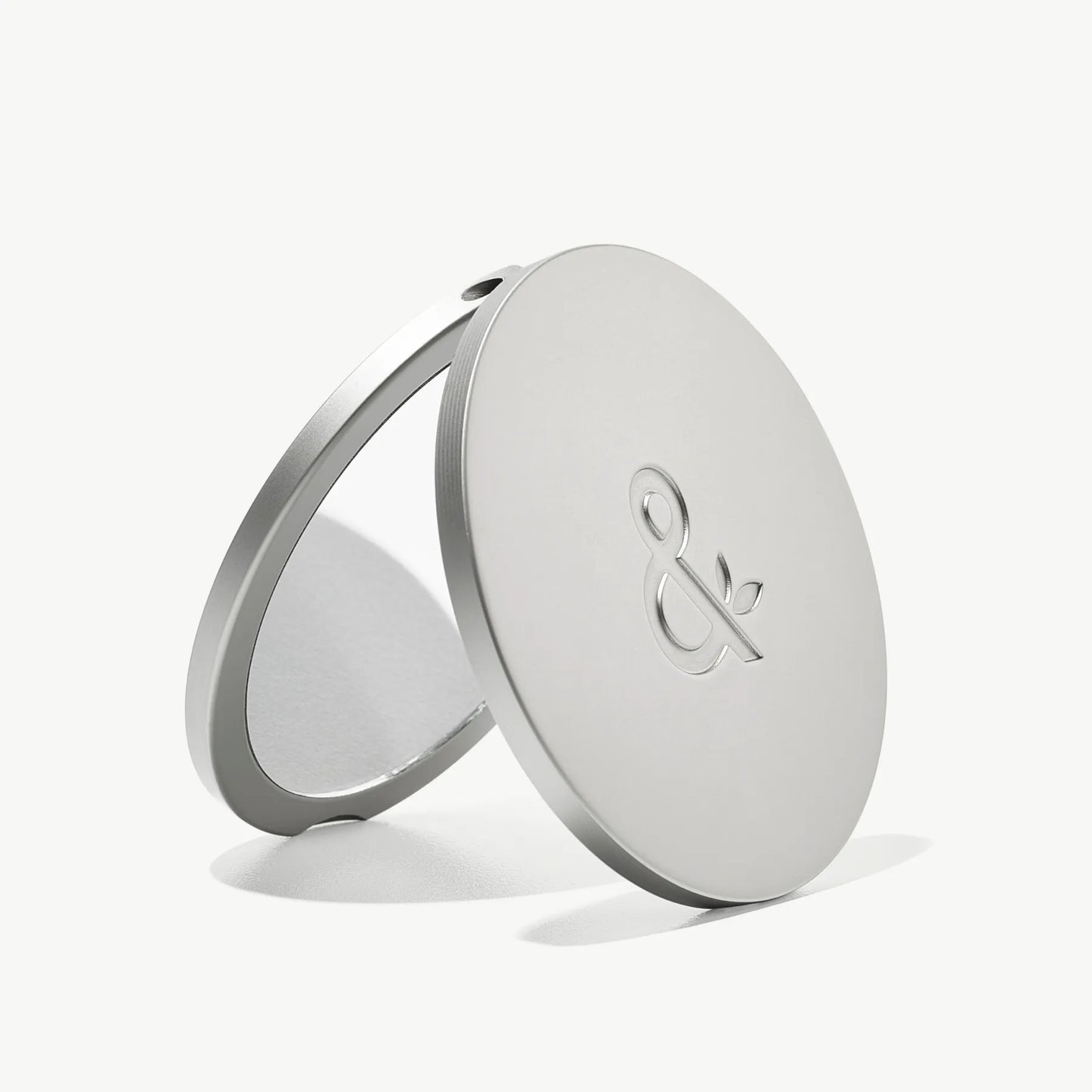 Luxe Compact Mirror: Touch up your glow, anywhere you go