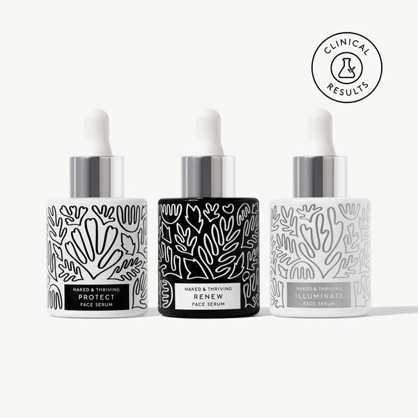 Naked & Thriving Radiant Serum Set with 3 botanical-patterned glass bottles
