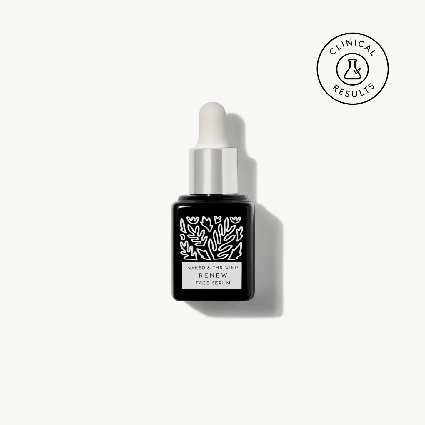 
                
                  Naked & Thriving travel-size Renew Resurfacing Night Serum in black glass dropper bottle with white botanical pattern
                
              