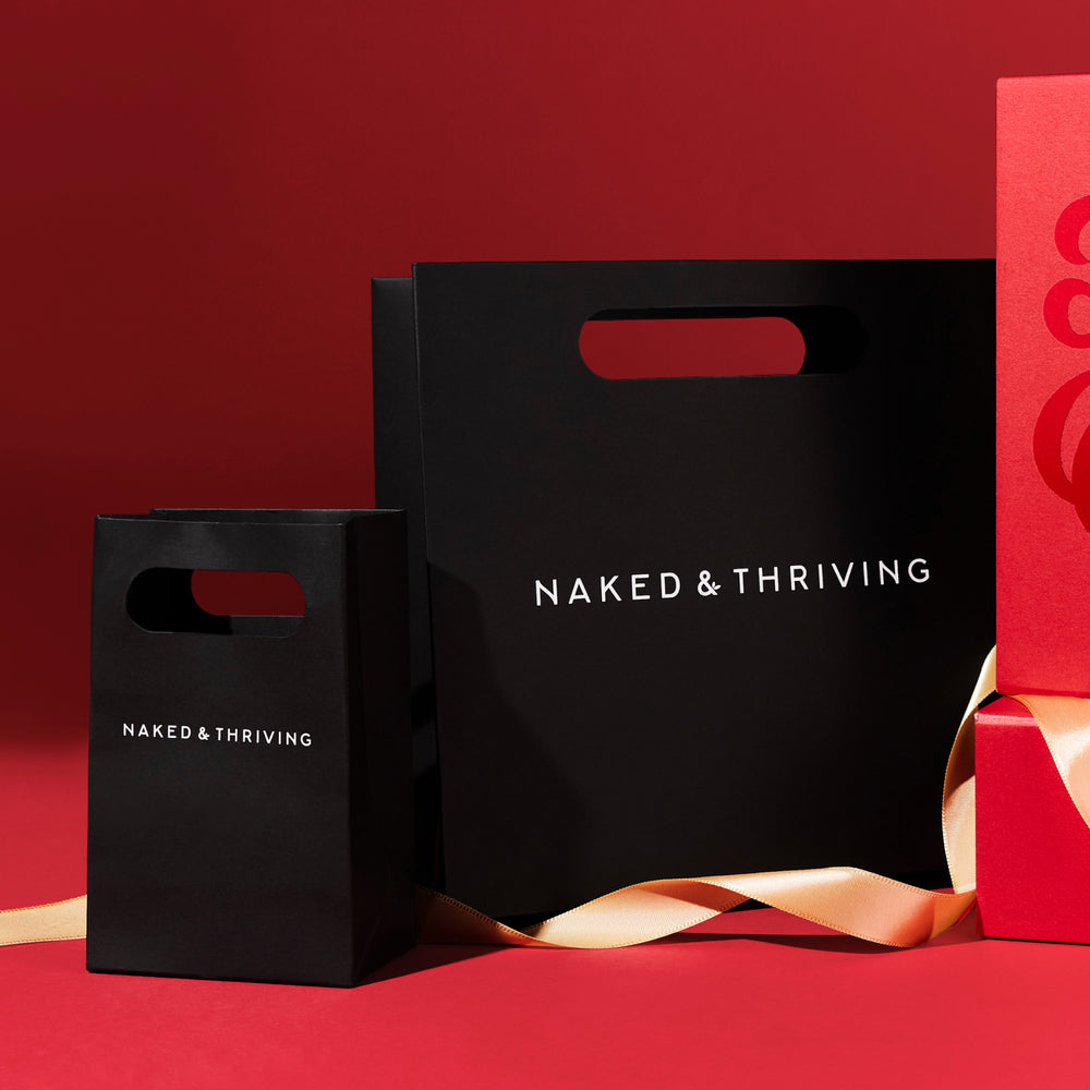 
                
                  Signature Gift Bag: Gift Gorgeously
                
              